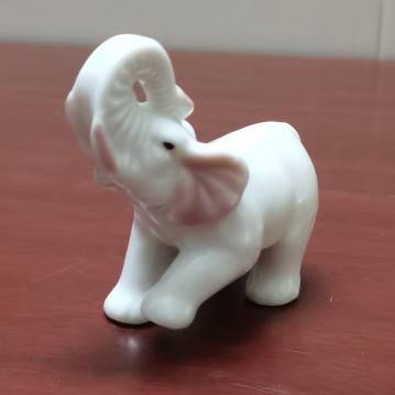 Exit original single -end hand -painted ceramic walking public elephant all -porcelain decoration creative gift crafts