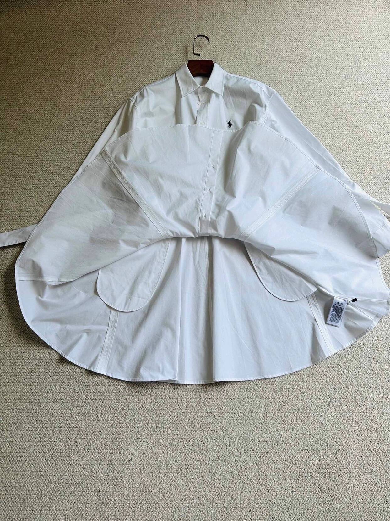 Chunyuan spring and autumn new small embroidery long -sleeved shirt collar pure white dress width under umbrella skirt women's waist is thin