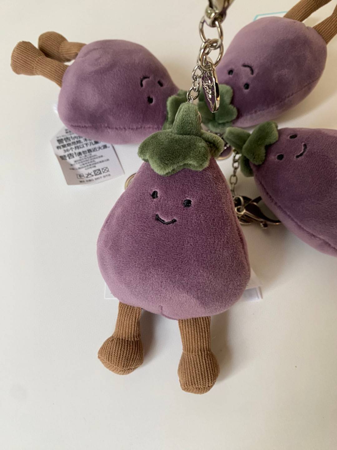 1.1 JC eggplant pendant keychain bag is decorated with plush toys cute doll