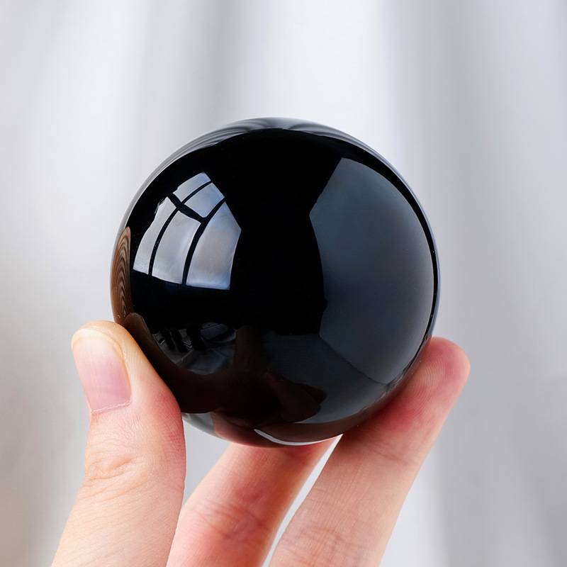Factory direct selling natural obsidian ornaments Crystal rough with black crystal ball manufacturers special offer