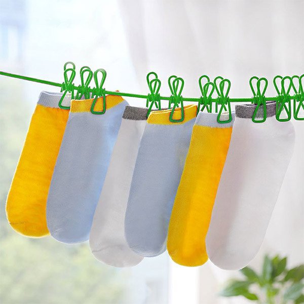 Hot sell Portable Travel Elastic Clothesline Adjustable Clothesline with 12pcs Clothespins for Outdoor and Indoor Use