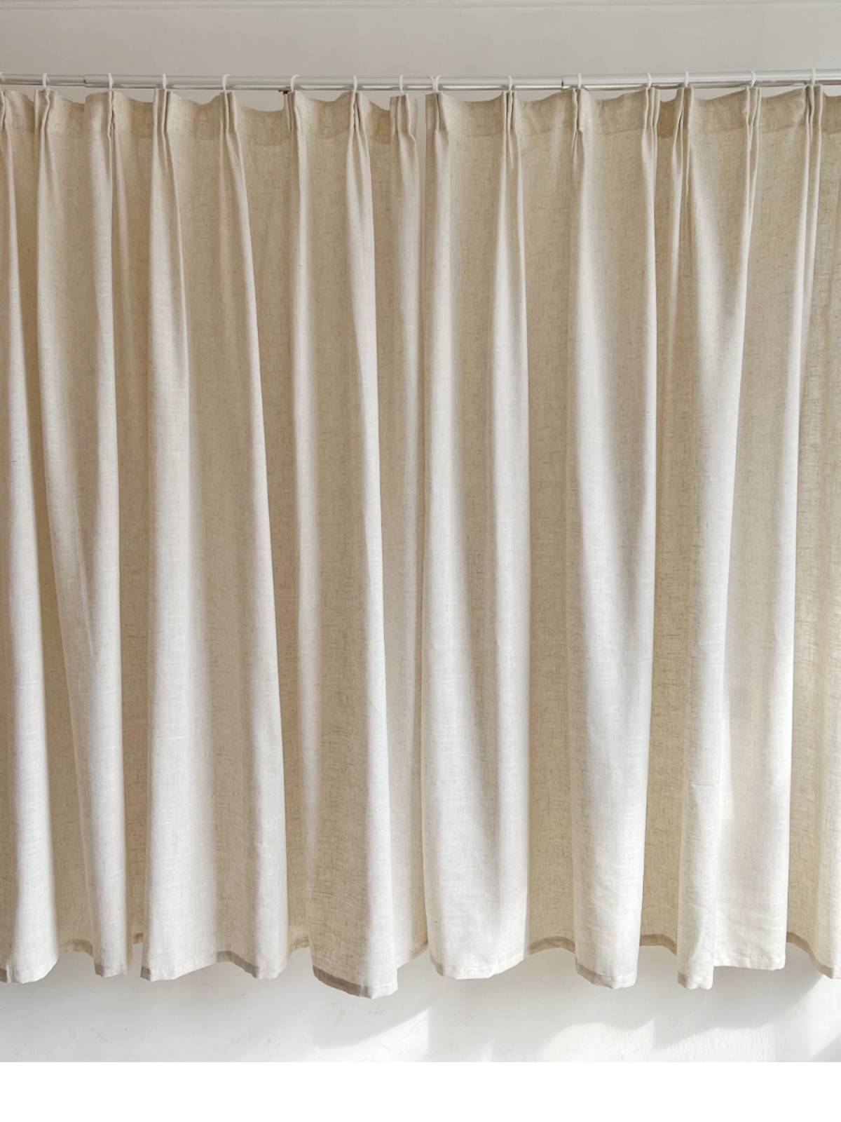 The bedroom linen is not penetrated by Japanese curtains