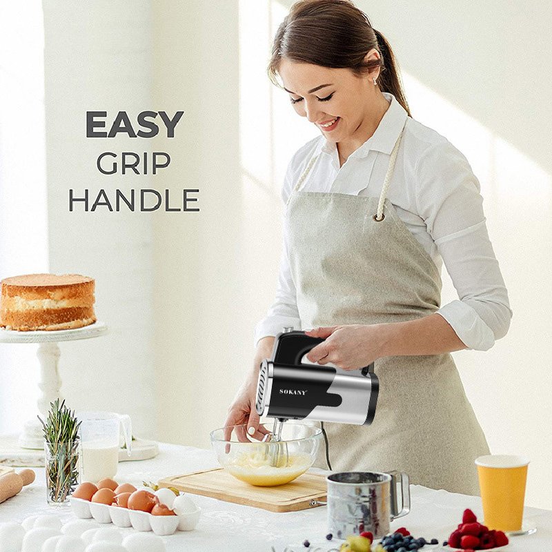 Make a cream cake and beat the eggs eggbeater electric blender