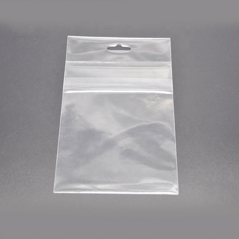 Factory Custom Price OPP Self Adhesive Bag Plastic Header Card Packing Bag With Hang Hole