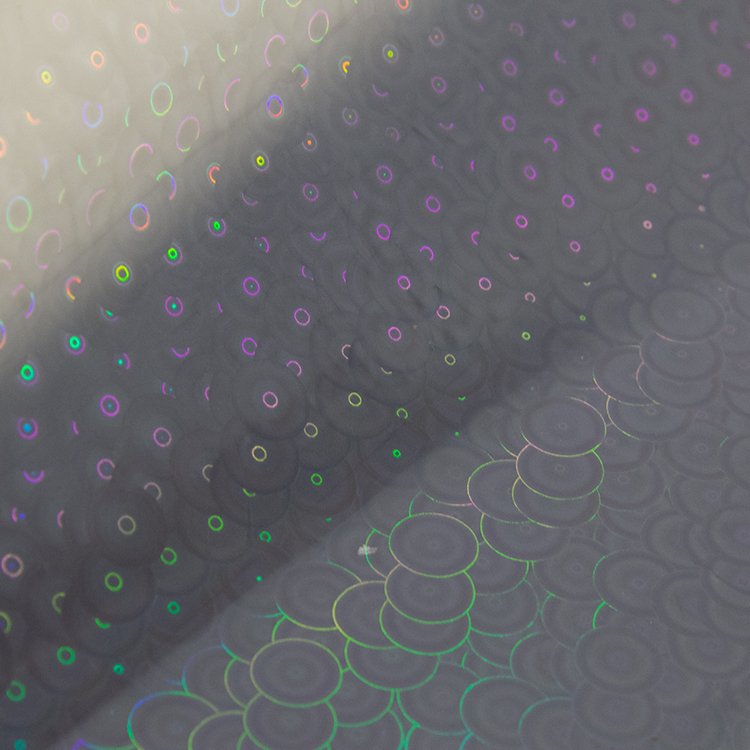 Cold laminating circle pattern self adhesive transparent holographic film