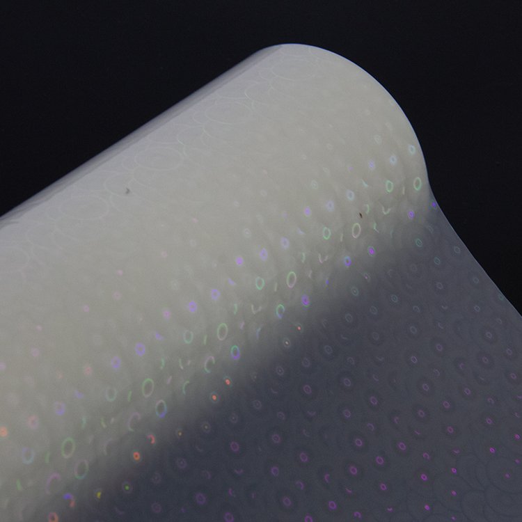 Cold laminating circle pattern self adhesive transparent holographic film