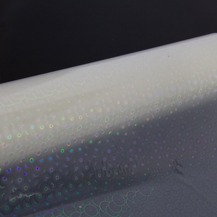 Cold laminating circle pattern self adhesive transparent holographic film