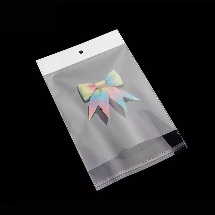 Wholesale Custom Printed BOPP OPP Self Adhesive Seal Bags Clear Transparent Jewelry Cellophane Plastic Bags With Seal Flap
