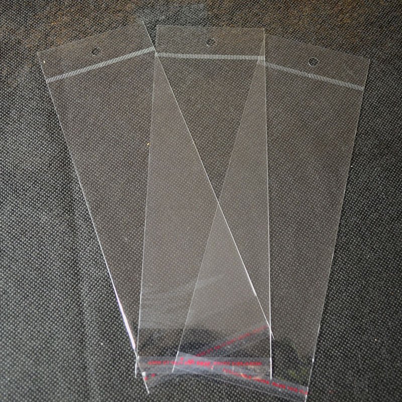 wholesale yiwu Custom Logo Plastic Plastic Opp self Adhesive Cello Bag With Header