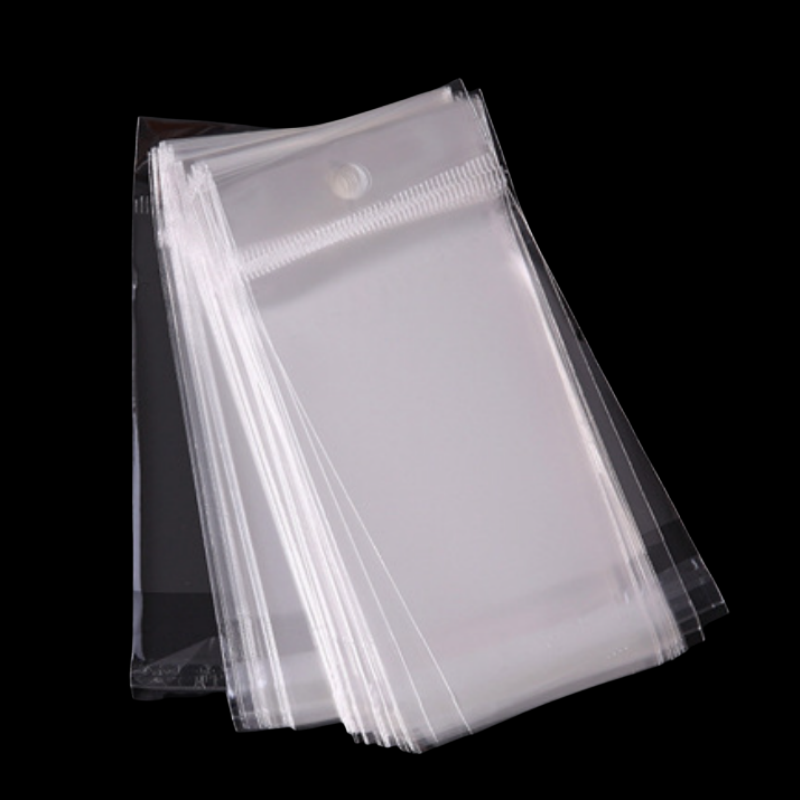 Self-adhesive transparent opp plastic packaging bags for packing clear self adhesive seal cellophane bag with hanging hole