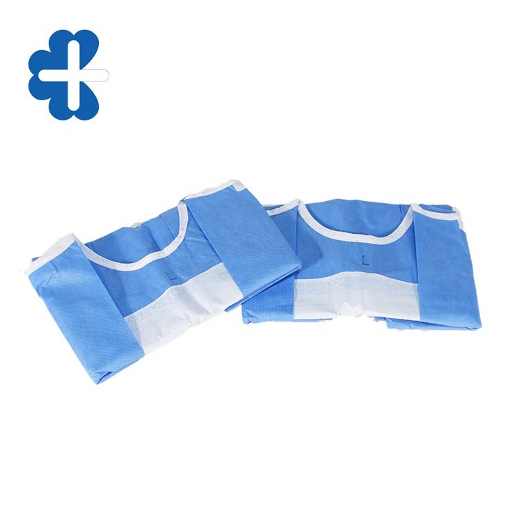 Universal Surgical Pack With Reinforced Surgical Gown And Adhesive Drape Table cover