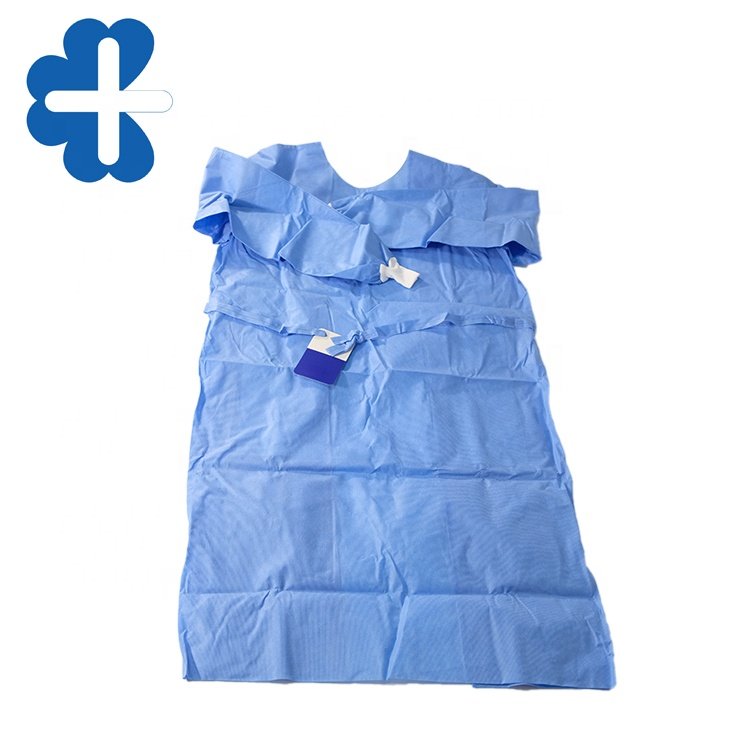 Universal Surgical Pack With Reinforced Surgical Gown And Adhesive Drape Table cover