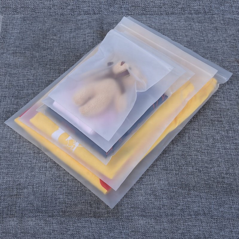 Wholesale custom frosted transparent plastic self adhesive CPE clothing packaging zipper bags with logos