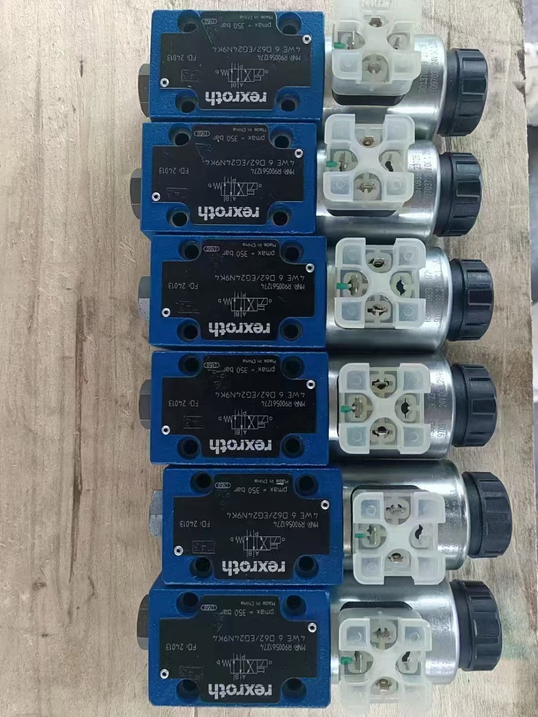 Original Rexroth 4WE Valve 4WE6E6X/EG24N9K4 4WE 6D62/EG24N9K4 4WE6J6X/EG24N9K4 4WE6G6X/EG24N9K4 Hydraulic Solenoid Valves