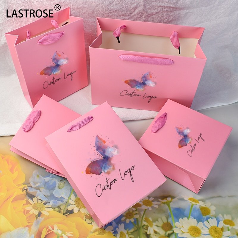 Recyclable pink gift bags with your own logo luxury shopping bags wholesale paper packaging handbag for women cosmetic bags