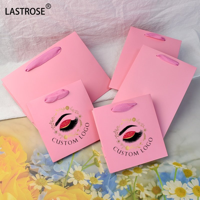 Recyclable pink gift bags with your own logo luxury shopping bags wholesale paper packaging handbag for women cosmetic bags