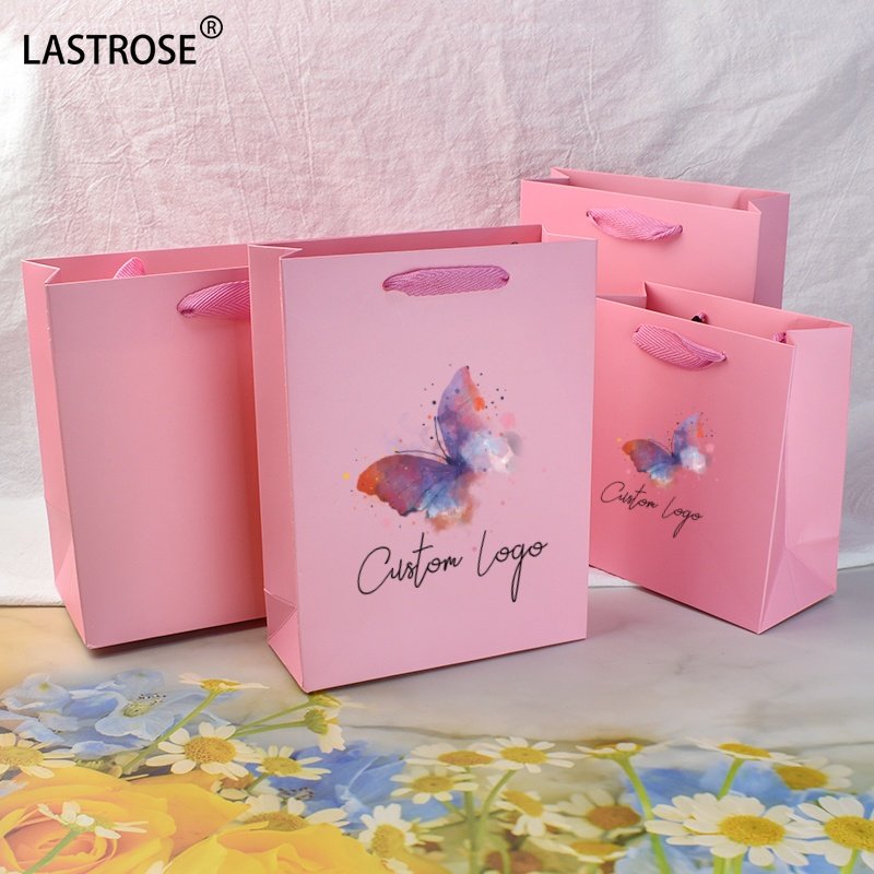 Recyclable pink gift bags with your own logo luxury shopping bags wholesale paper packaging handbag for women cosmetic bags