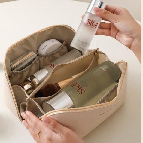 kunhaoOrgan Pillow Cloud PU leather makeup bag Travel portable portable storage bag Network Red Premium sense toiletry bag