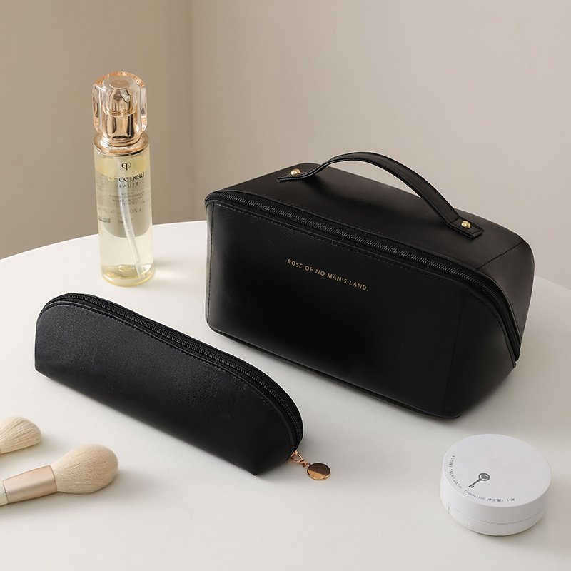 kunhaoOrgan Pillow Cloud PU leather makeup bag Travel portable portable storage bag Network Red Premium sense toiletry bag