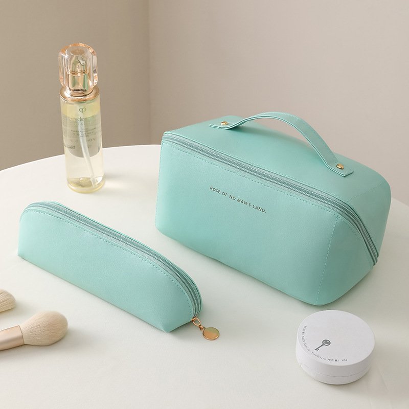 kunhaoOrgan Pillow Cloud PU leather makeup bag Travel portable portable storage bag Network Red Premium sense toiletry bag