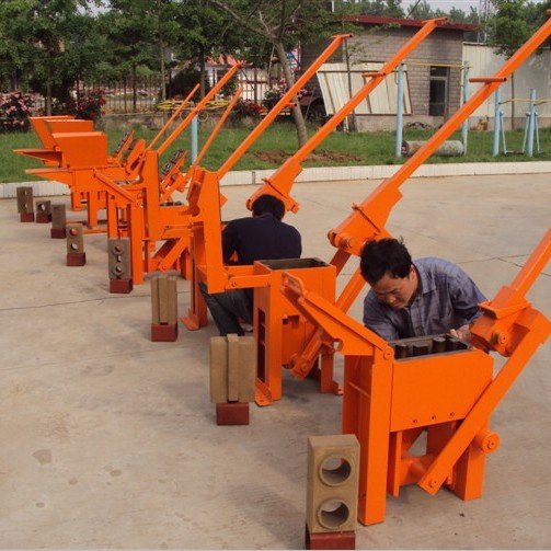 low price QMR2-40 Manual Double Mud Clay Interlocking Bricks Making Machine