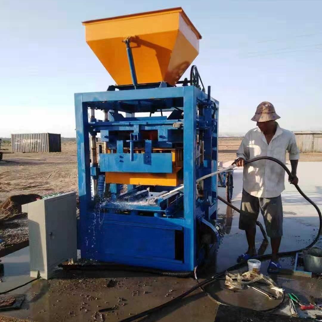 cheap manual cement concrete hollow color paver brick making machine semi automatic block machinery from China