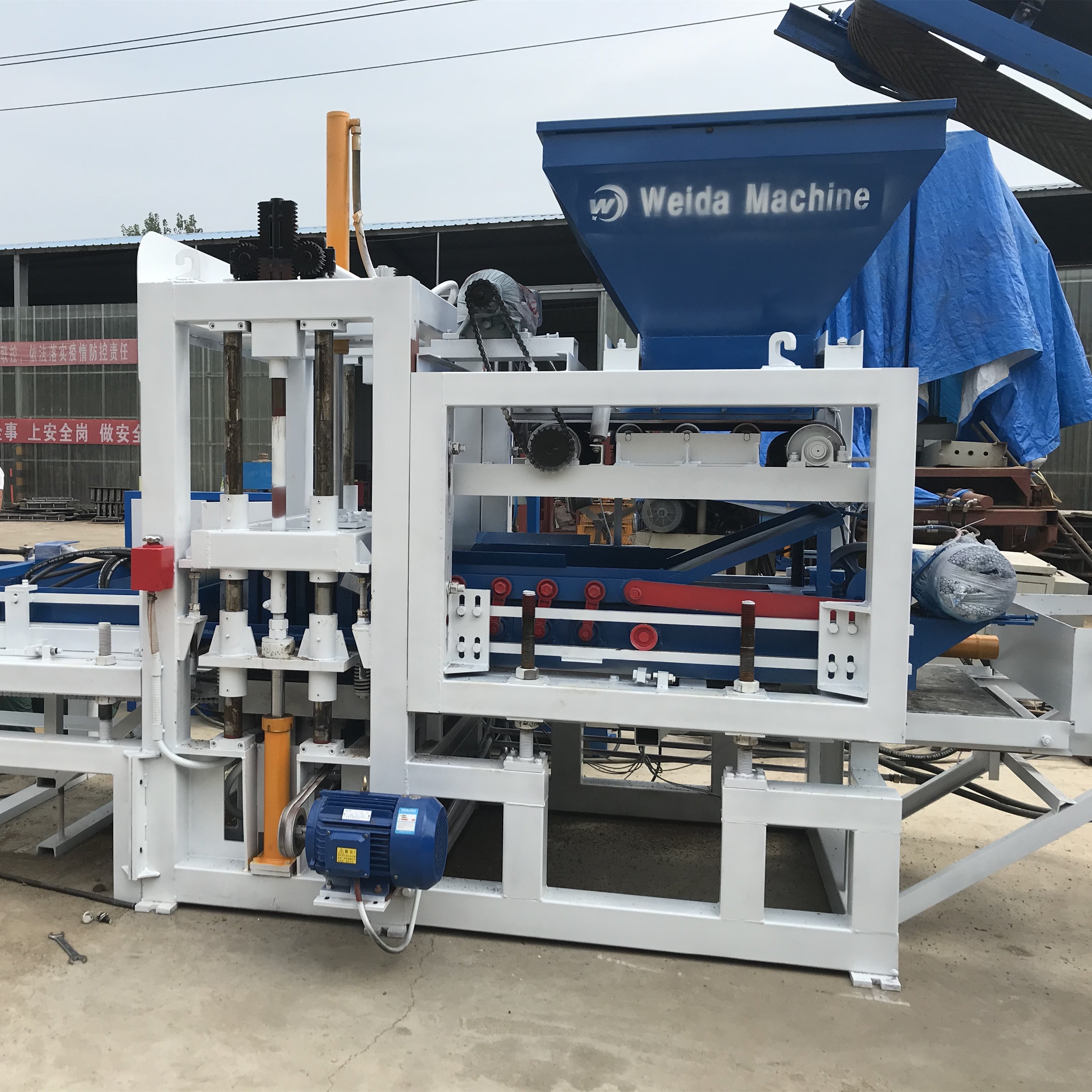 QT4-15S weida brand cement brick making machine interlock fly ash brick making machine price small block making machine