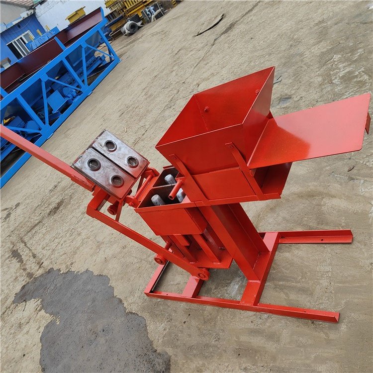 Small eco brava interlocking brick machine moulds QMR2-40 manual soil clay interlocking brick machine