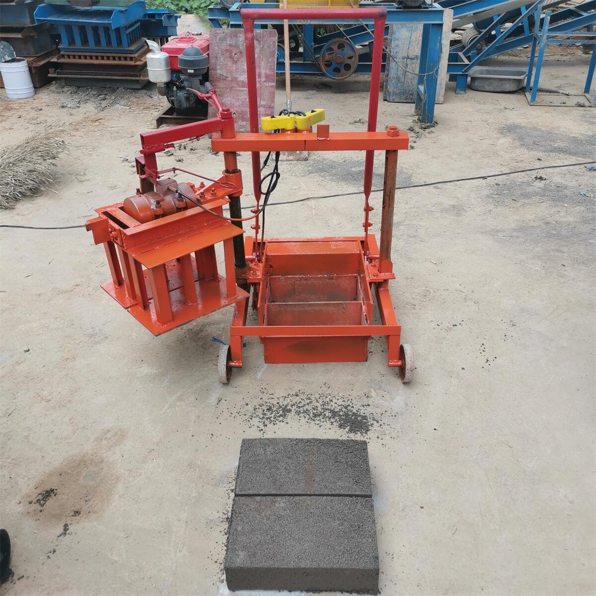 High quality Ivory Coast small mobile block machine. Semi-automatic hollow block moulding machine. Concrete Brick Making Machine