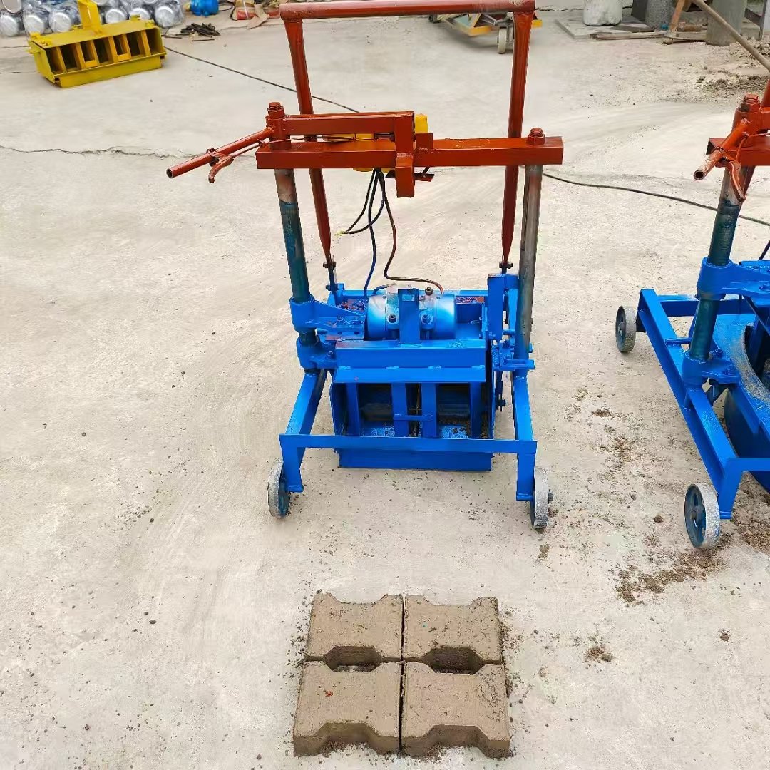 China Sourced Top Quality Interlocking Paving Cement Concrete Blocks Making Machine Automatic with Moving Wheels