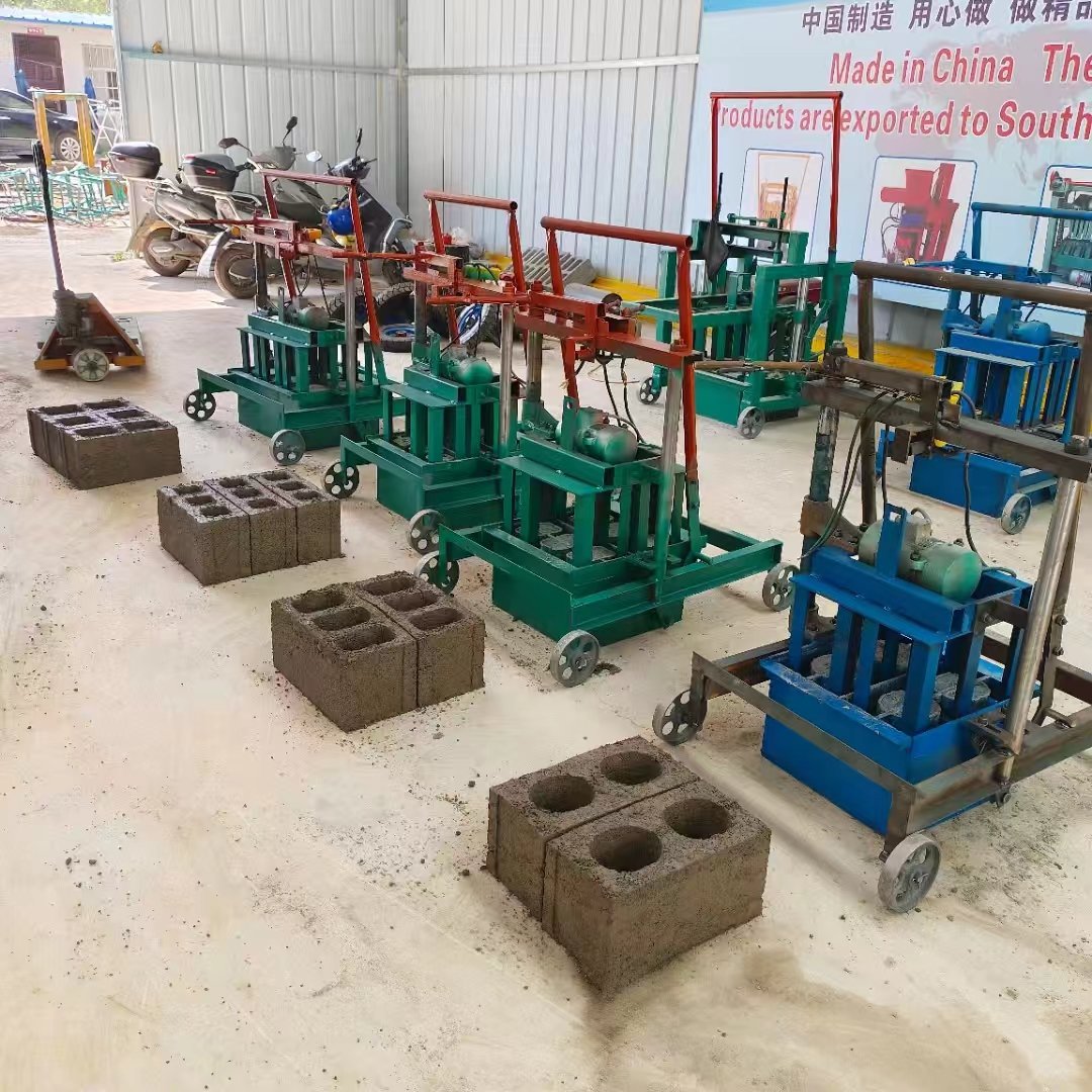 China Sourced Top Quality Interlocking Paving Cement Concrete Blocks Making Machine Automatic with Moving Wheels