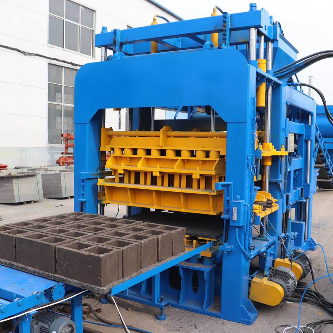 Money making machine QT12-15 automatic machine making concrete hollow blocks and bricks machine