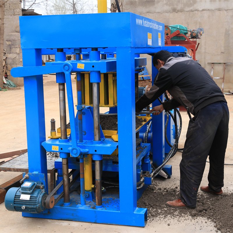 TIEJIA Popular QT40 Manual Hollow Interlocking Block Brick Making Machine with Low price Hollow Block Making Machine