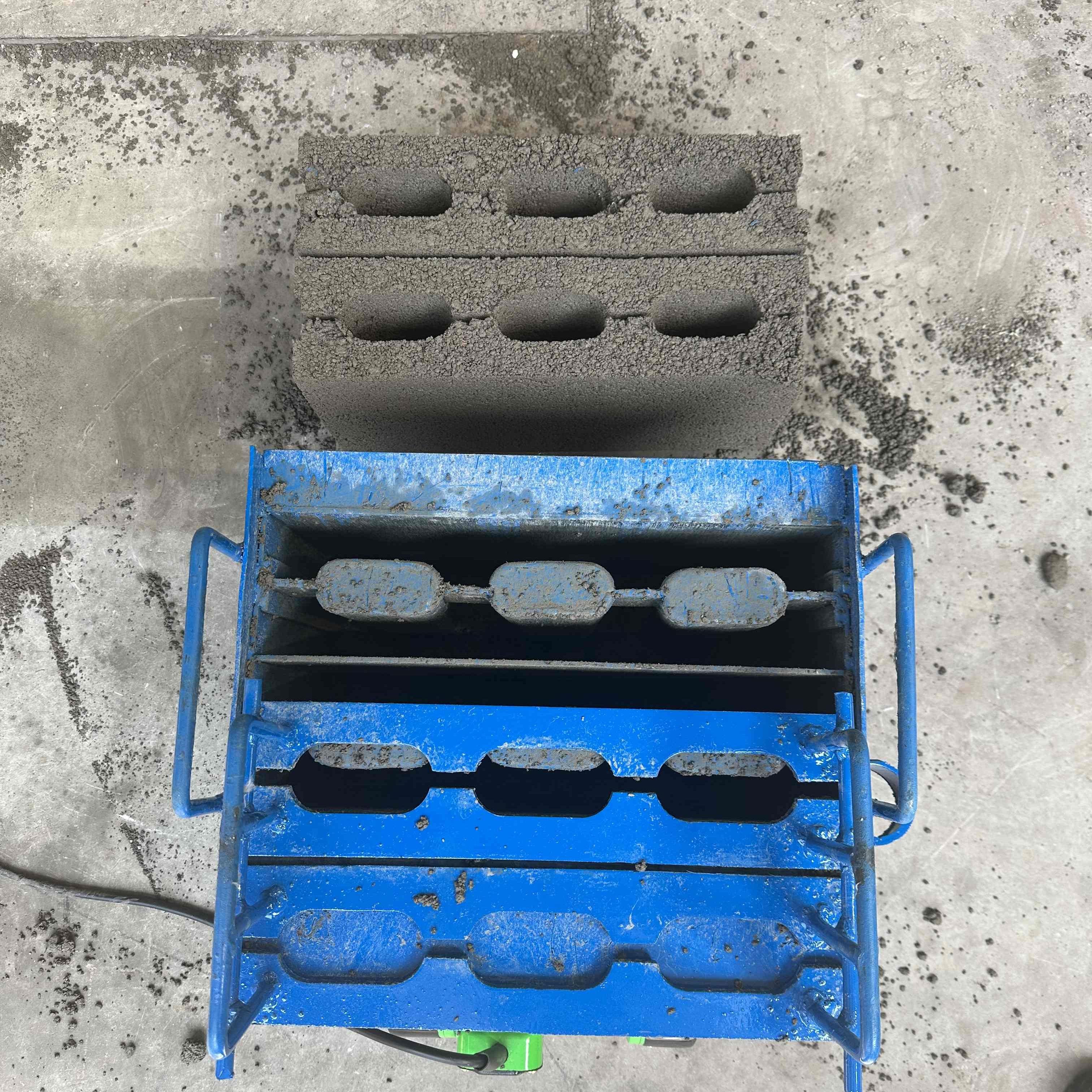 new modern movable portable togo brick making machine egg laying small cement brick making machine semi automatic china