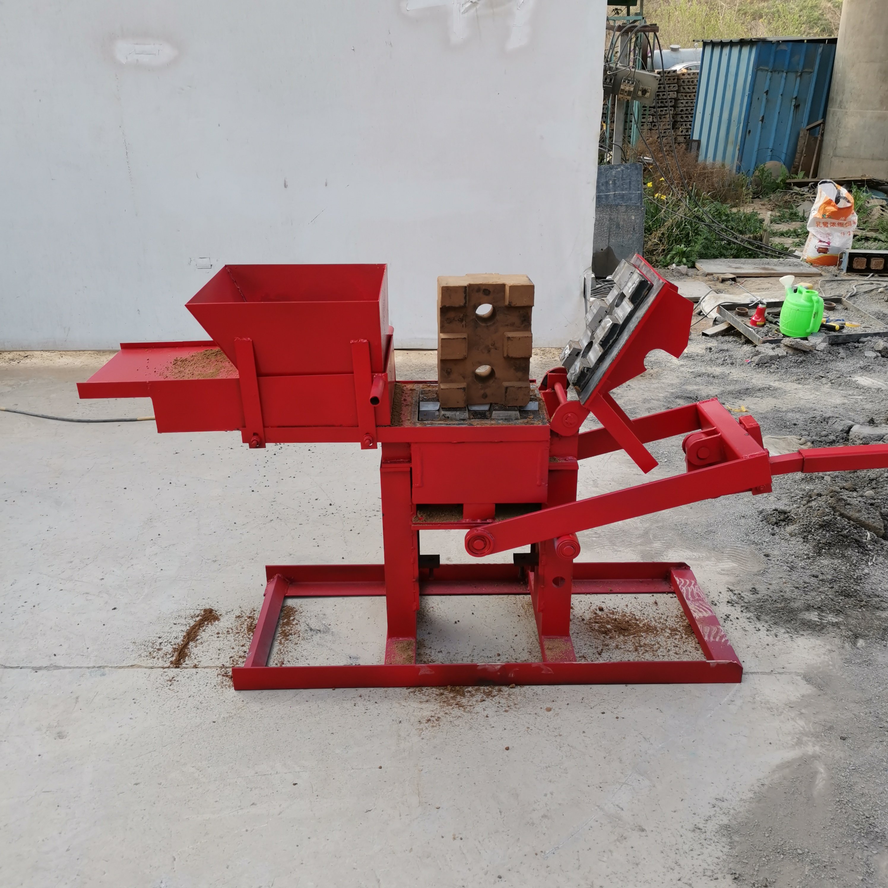 Small manual interlocking hollow solid red clay mud clay brick block machine 300-150-100mm