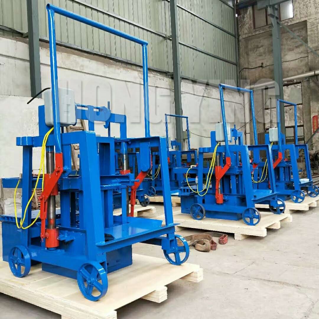 The factory direct sale free - burning hollow brick machinery small mobile cement brick making machine