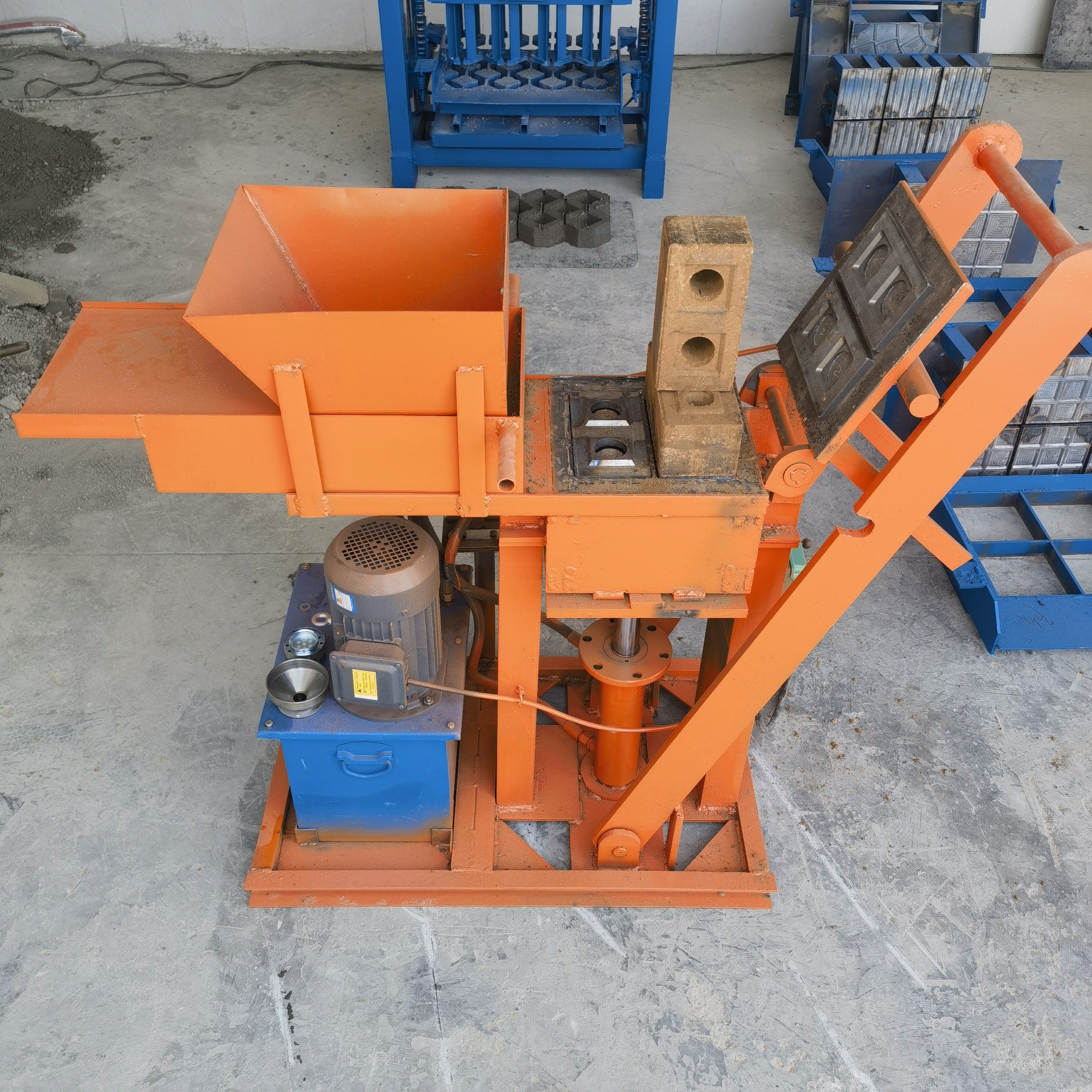 Custom molds to produce solid bricks 4at a time. Low Price Hydraulic Pressing Clay Soil Interlocking Block Brick Making Machine