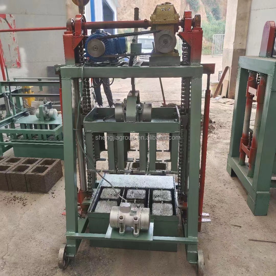 Low cost mobile egg laying type simple operation cement concrete brick making machine