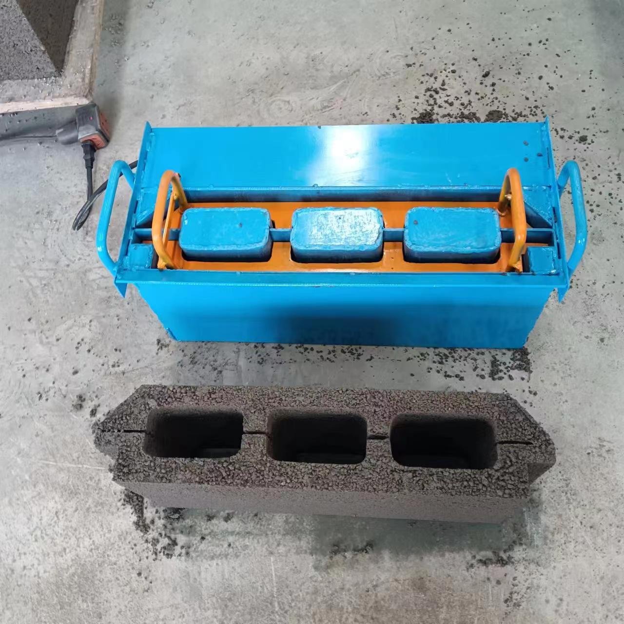 Best selling rural household manual brick making machine one piece at a time portable brick making machine two-phase electric ho
