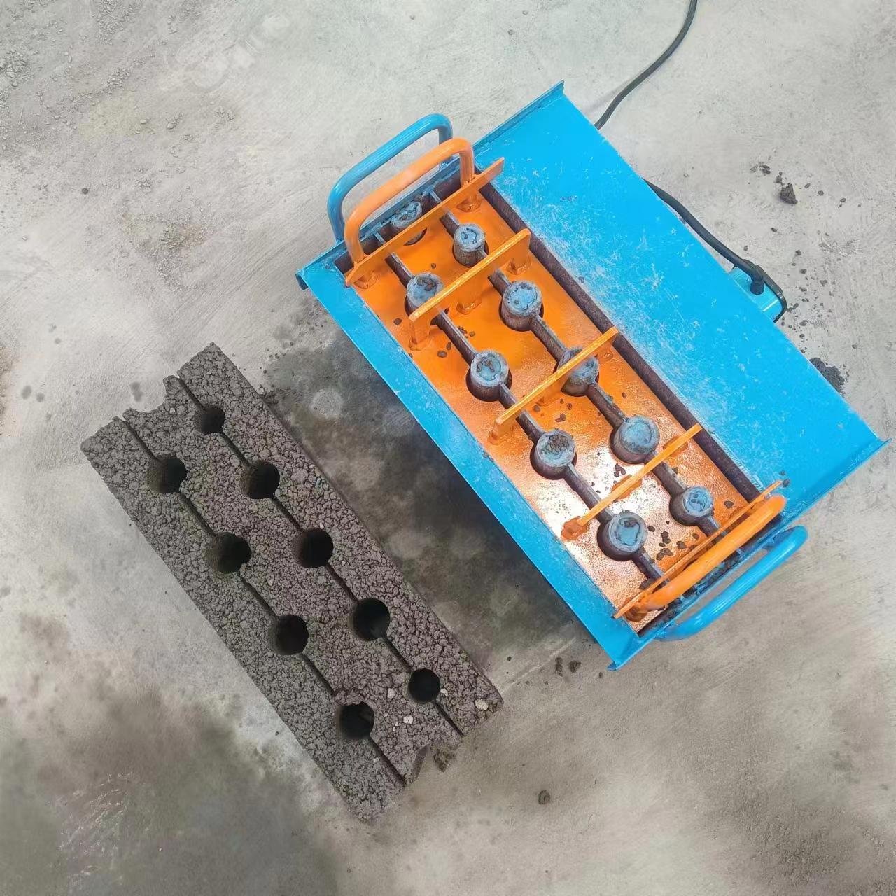 Best selling rural household manual brick making machine one piece at a time portable brick making machine two-phase electric ho