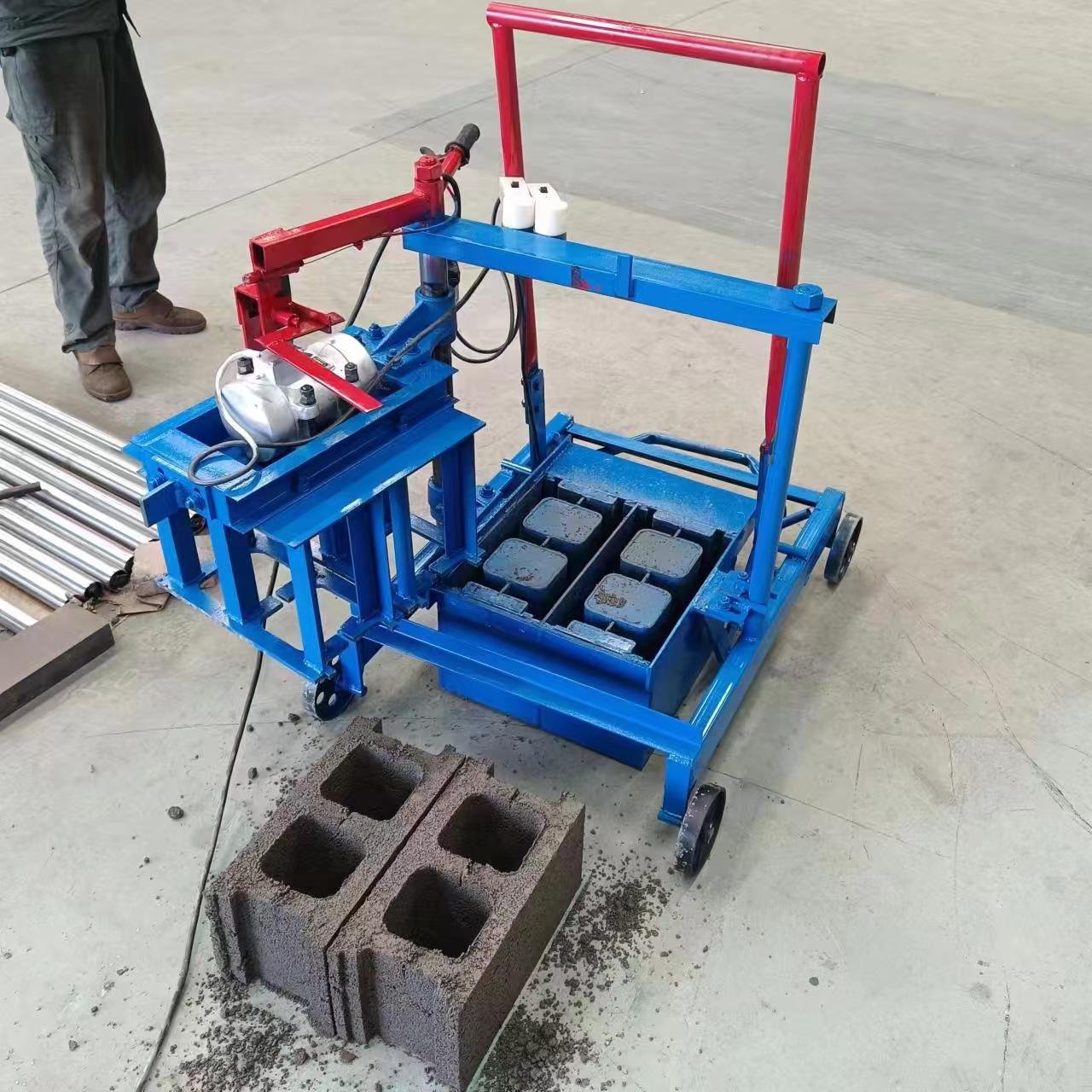 Cheap manual concrete cement block brick making machine Hollow concrete block brick making machine with replaceable molds