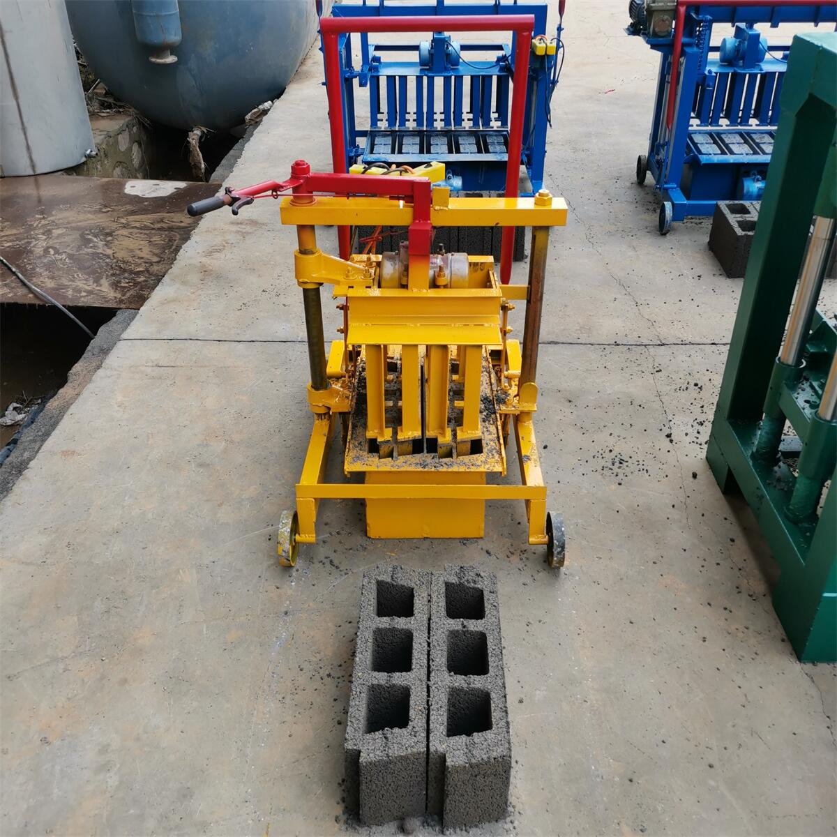 manual brick making machine in papua new guinea KM2-45 Electric Cement Block Machine Producing wave-shaped paving blocks
