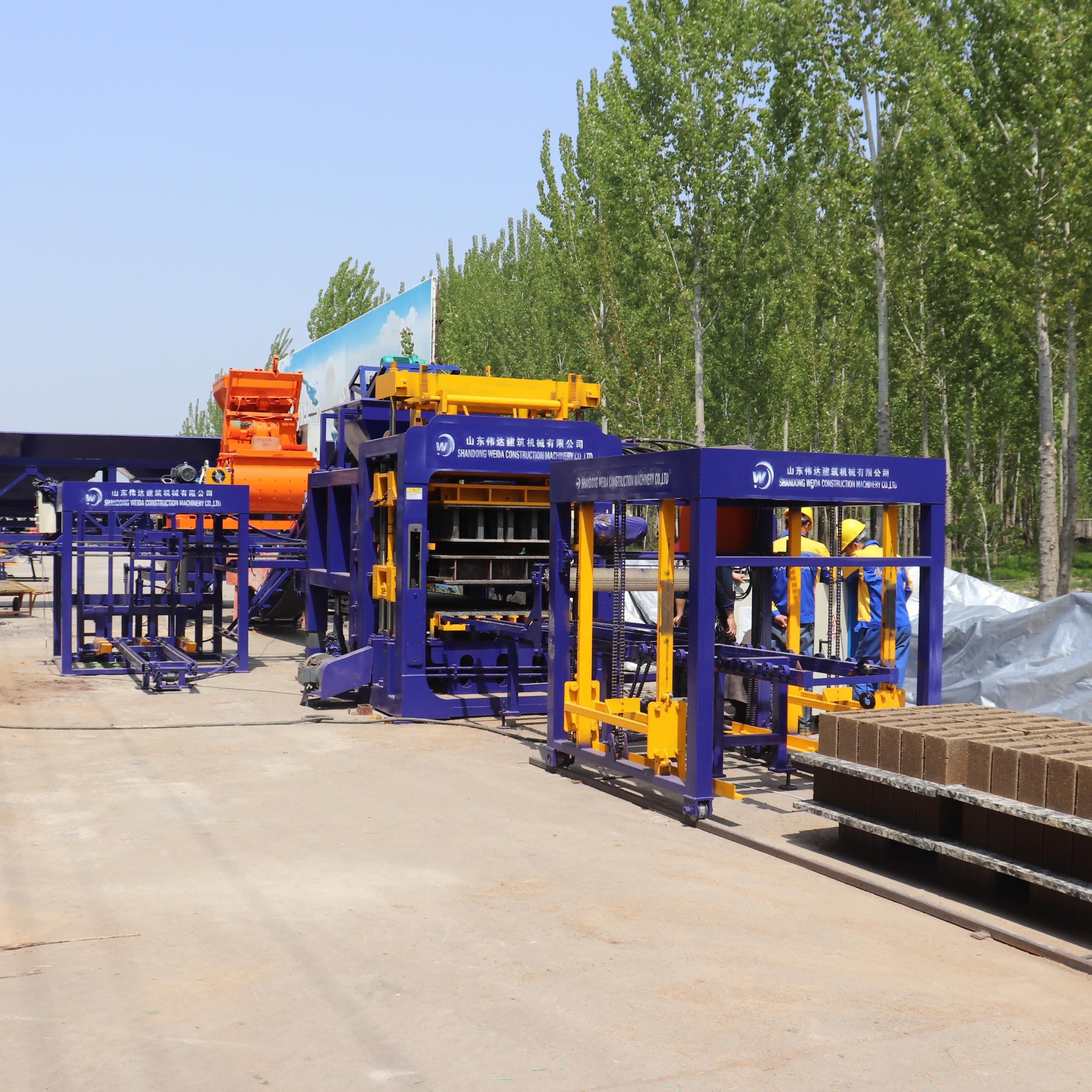 hot sale QT10 - 15 cement interlocking brick making machinery automatic hollow concrete block making machine