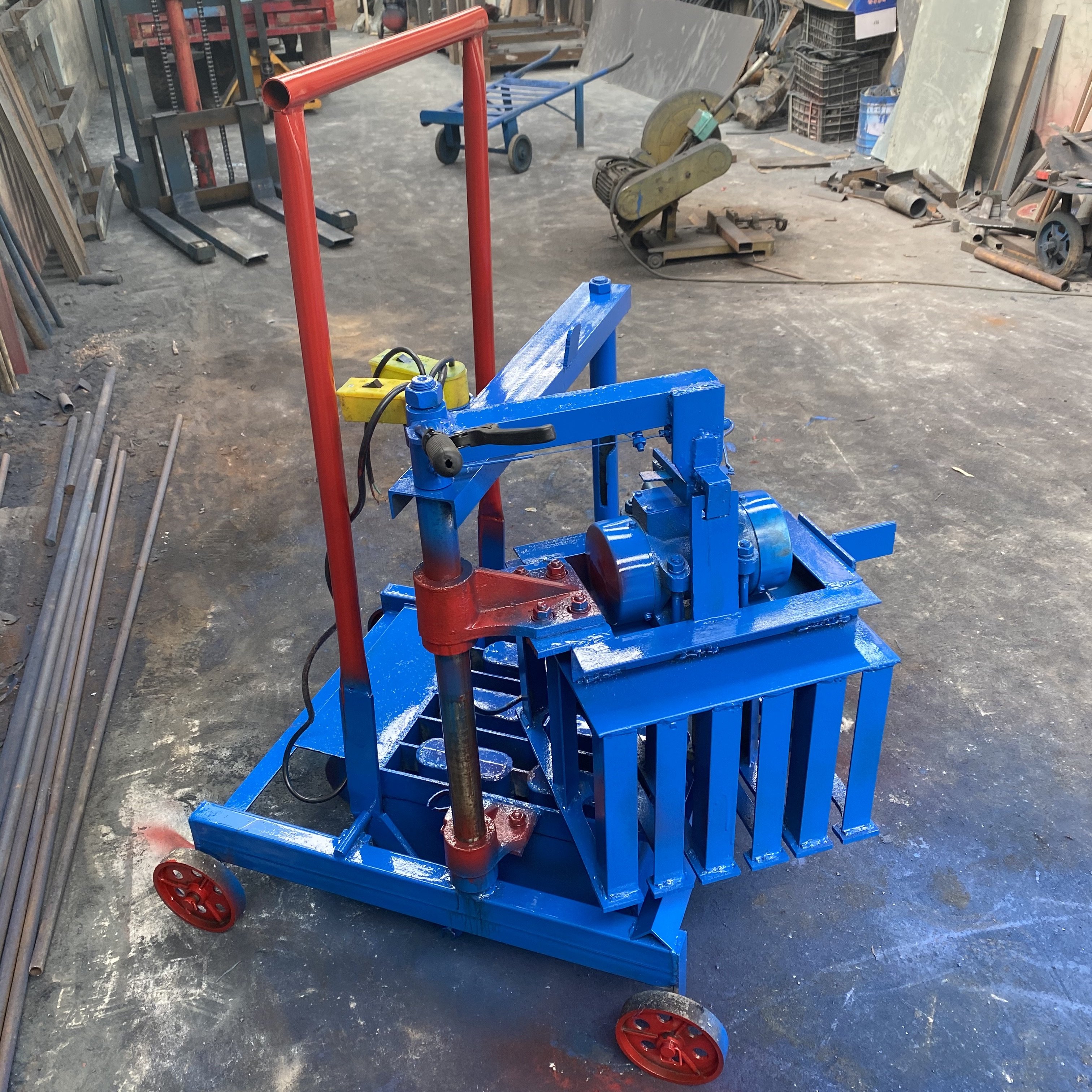 The 4-10 Brick Machine Is An Interlocking Block Making Machine That Uses Compressed Earth Clay Soil Mud By Brick Making Machine
