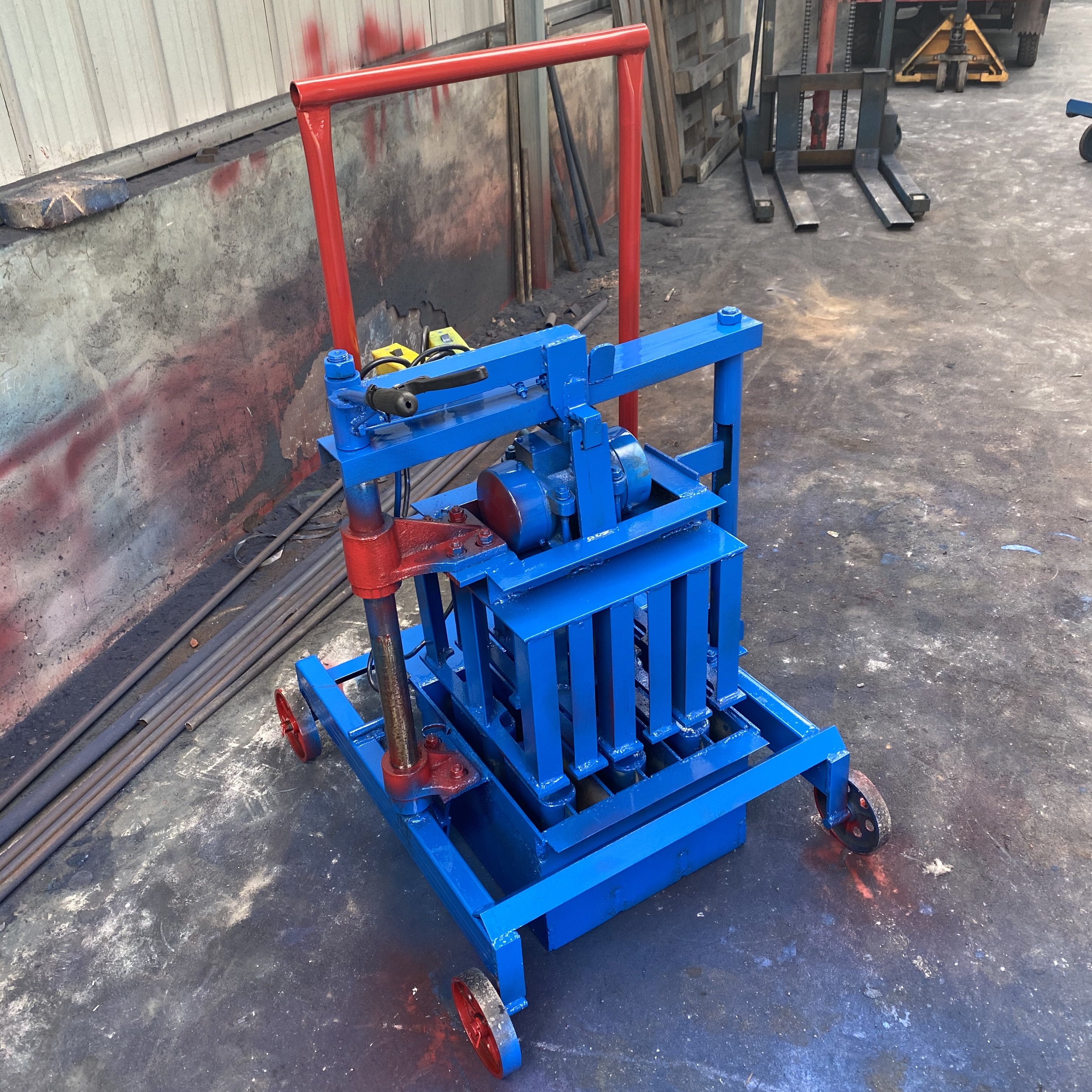 The 4-10 Brick Machine Is An Interlocking Block Making Machine That Uses Compressed Earth Clay Soil Mud By Brick Making Machine