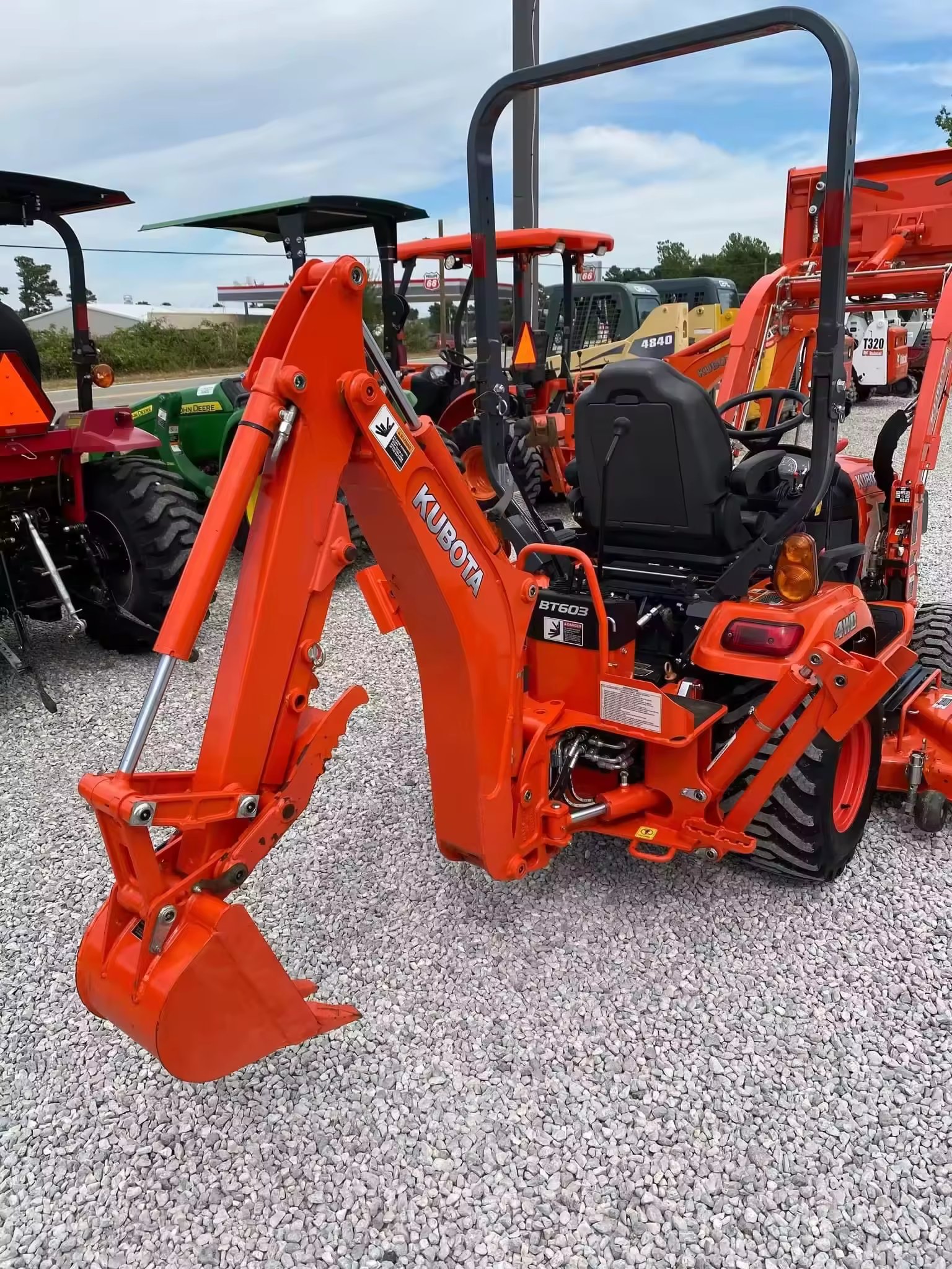USED MINI KUBOTA BX-23S backhoe loader/ SMALL loader WITH MOWER ATTACHED all in good condition