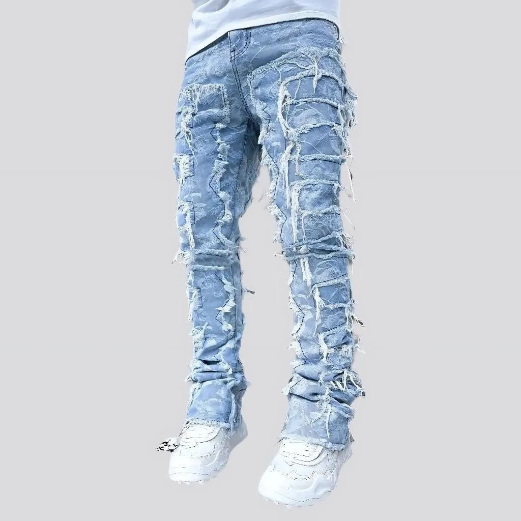 Custom designer men blue distressing stacked jeans Enzyme wash distress denim trousers