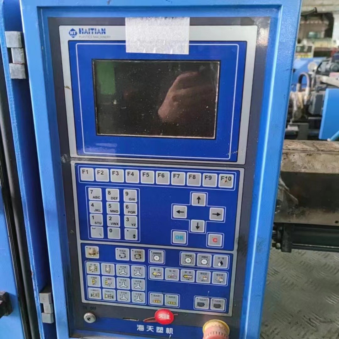 Second-hand Haitian 60ton servo motor plastic toys mobile phone protective shell injection molding machine
