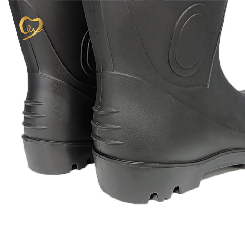 All black, pvc safety rain boots with steel toe steel sole for a variety of working environments
