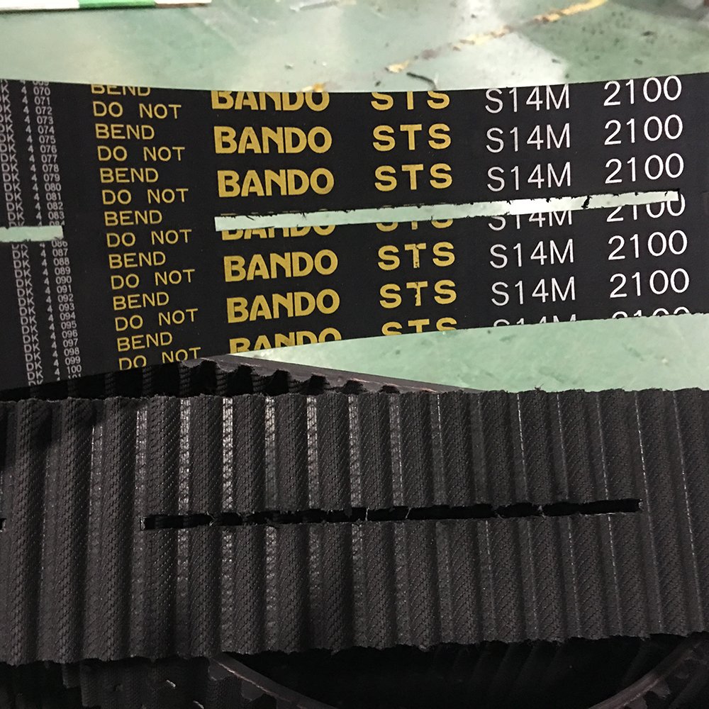 Slotted rubber timing belt